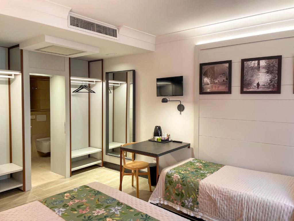 Postel nebo postele na pokoji v ubytování Duccio Nacci Rooms- Guesthouse