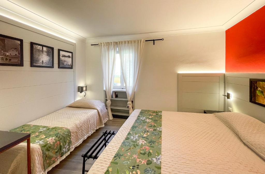 Postel nebo postele na pokoji v ubytování Duccio Nacci Rooms- Guesthouse