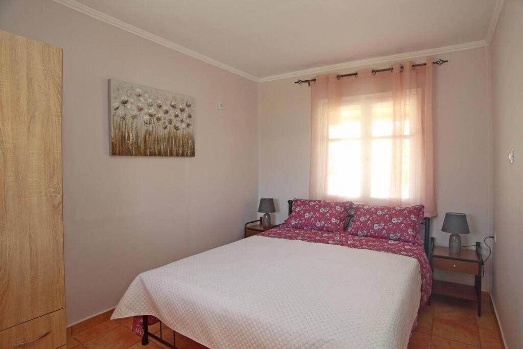Posteľ alebo postele v izbe v ubytovaní Olga Home Agios Ioannis Lefkada - Lefkada BnB