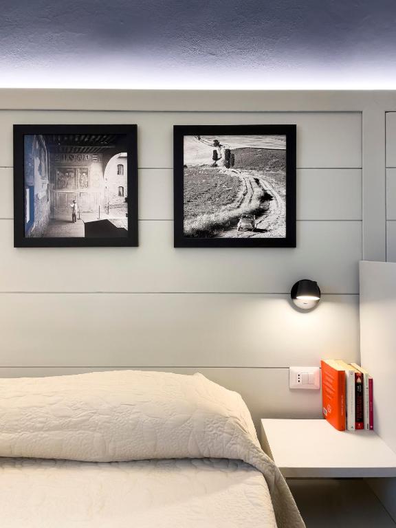 Postel nebo postele na pokoji v ubytování Duccio Nacci Rooms- Guesthouse