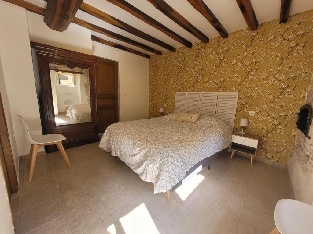 Postel nebo postele na pokoji v ubytování LE RELAIS VAUBAN