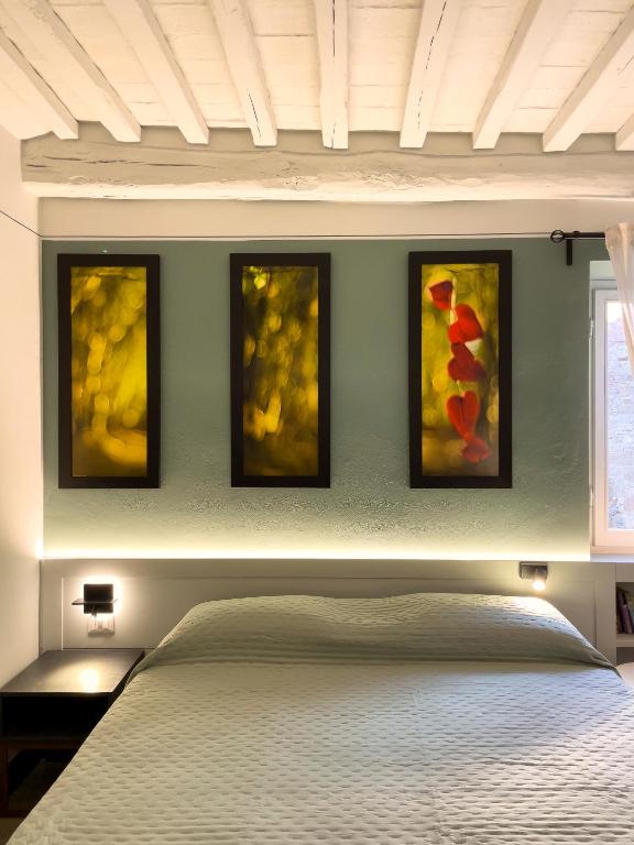 Postel nebo postele na pokoji v ubytování Duccio Nacci Rooms- Guesthouse