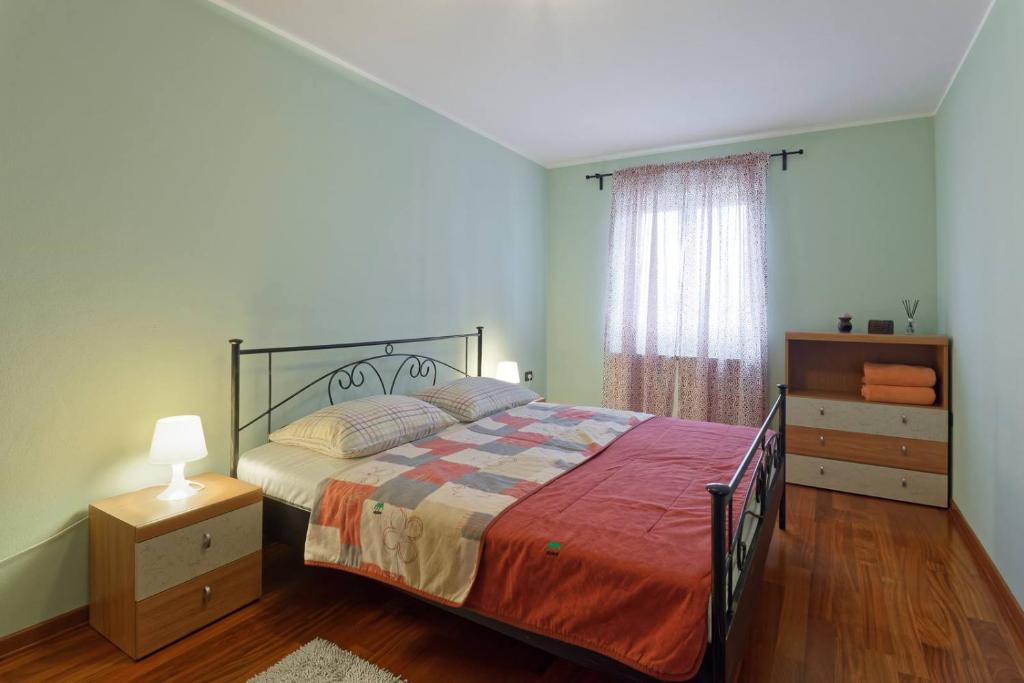 Łóżko lub łóżka w pokoju w obiekcie Apartment Maritea by Rent Istria