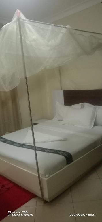 Postel nebo postele na pokoji v ubytování Kikaplace