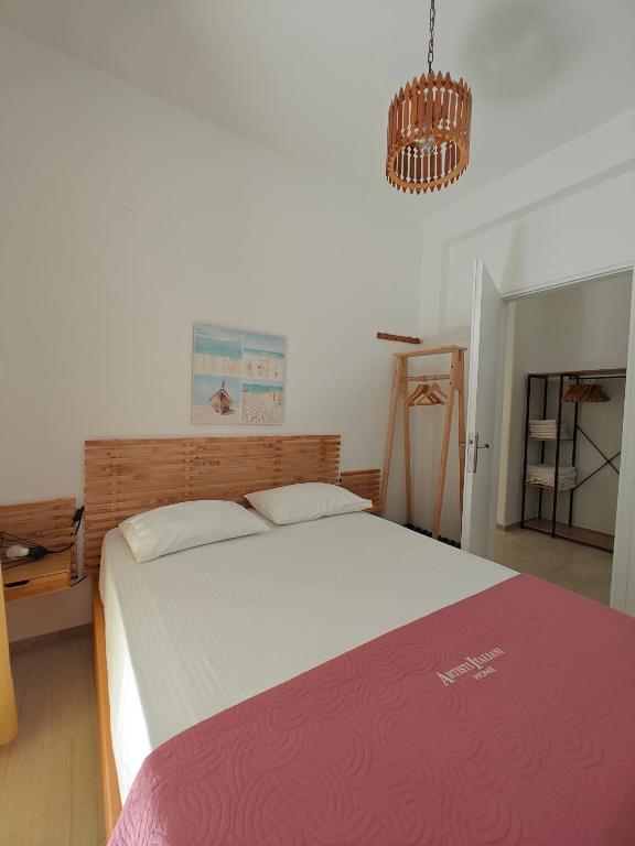 Postel nebo postele na pokoji v ubytování Anthoula House Sarti