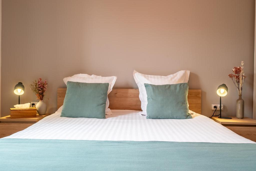 Posteľ alebo postele v izbe v ubytovaní Mon Appart'hôtel - Gare de Limoges - Appartement familial - Parking en supp