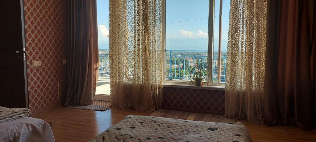 Postel nebo postele na pokoji v ubytování Panorama in KUTAISI