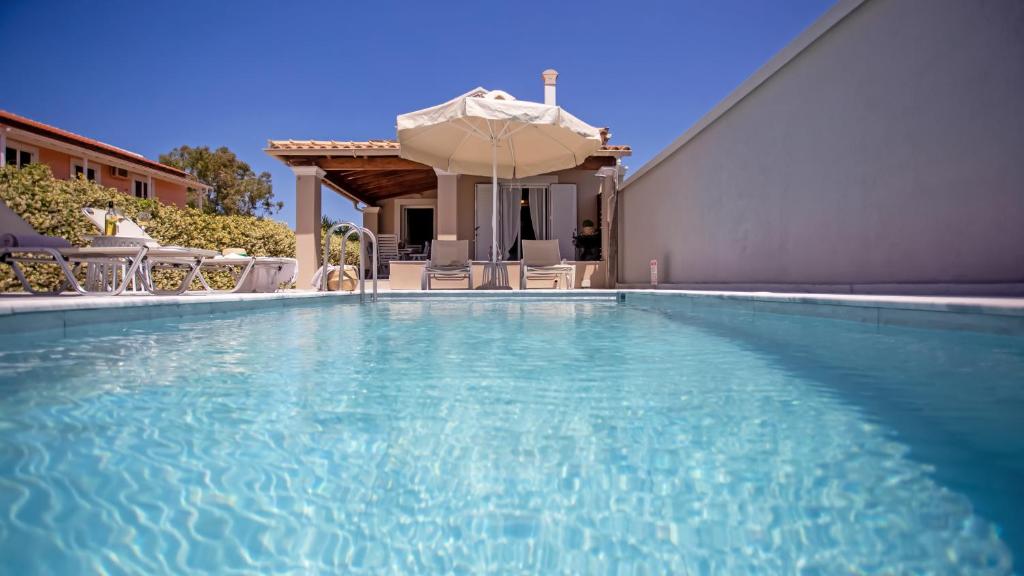 The swimming pool at or close to Cosmos Villas Spyridoula