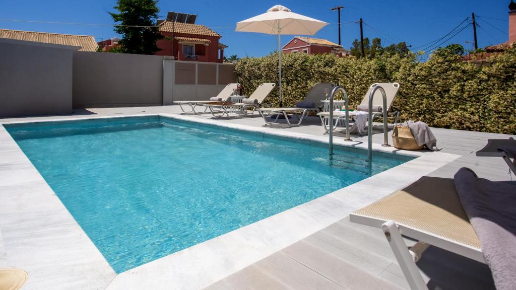 The swimming pool at or close to Cosmos Villas Spyridoula