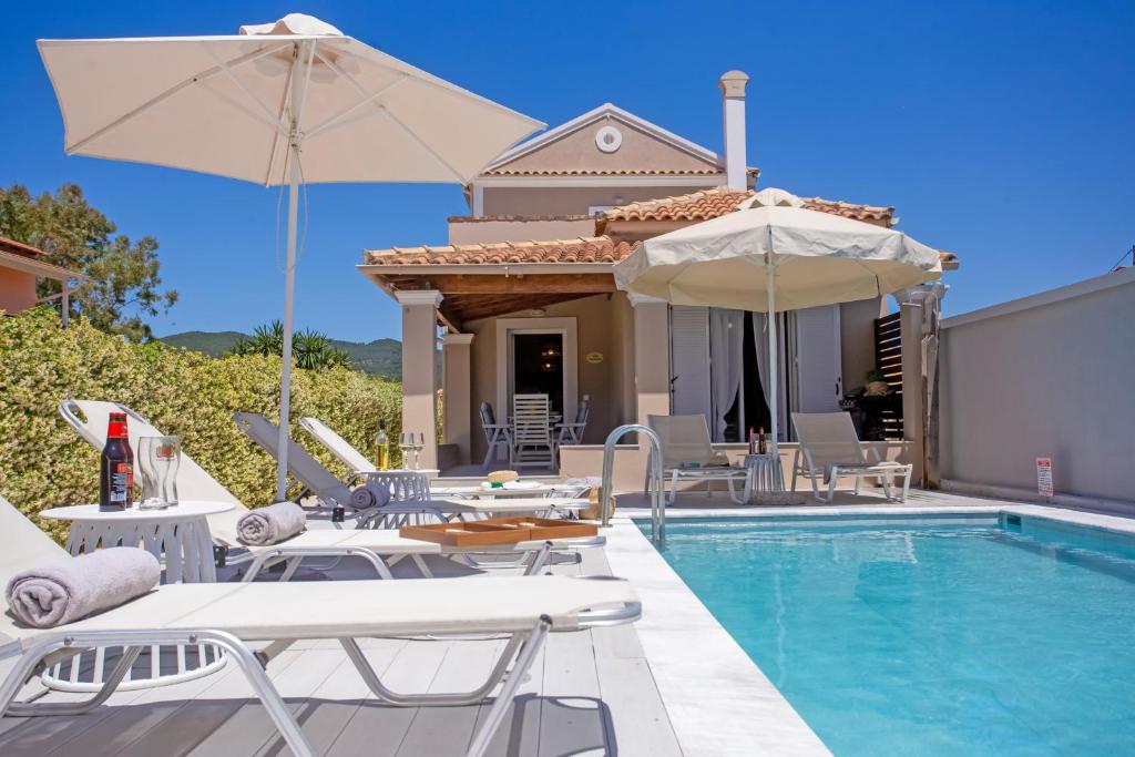 The swimming pool at or close to Cosmos Villas Spyridoula