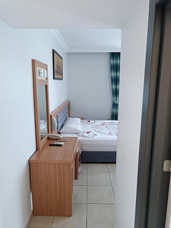 Postel nebo postele na pokoji v ubytování Wonder Life Hotel