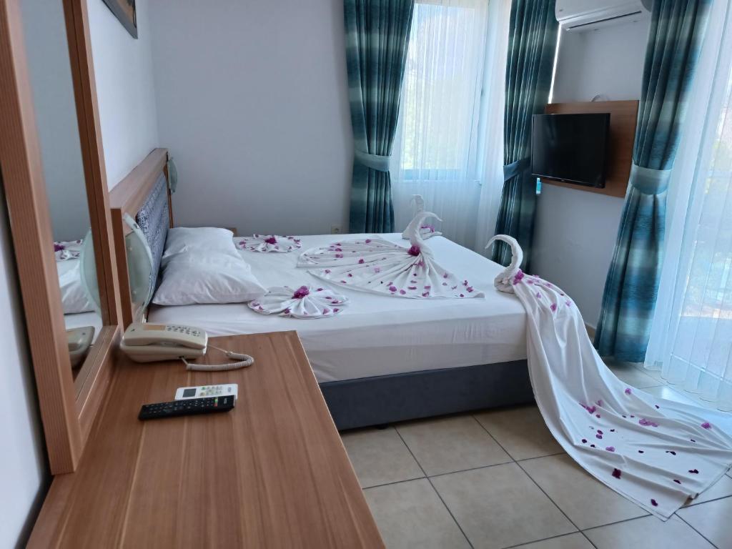 Postel nebo postele na pokoji v ubytování Wonder Life Hotel
