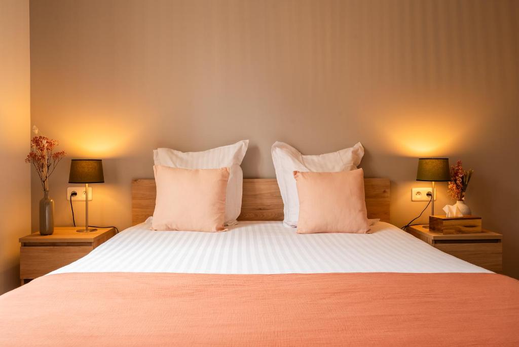 Posteľ alebo postele v izbe v ubytovaní Mon Appart'hôtel - Gare de Limoges - Appartement familial - Parking en supp