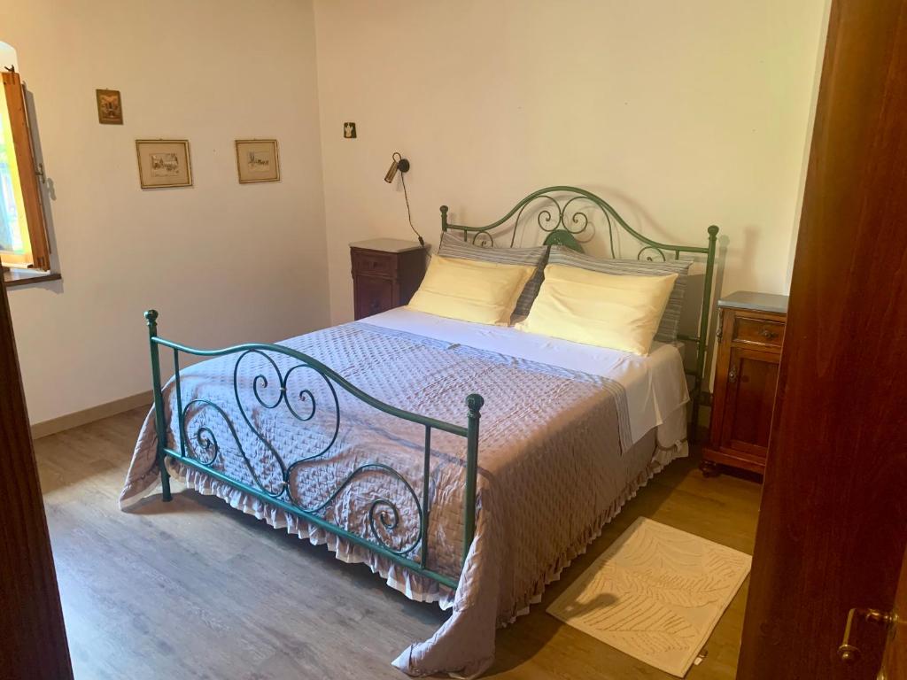 Posteľ alebo postele v izbe v ubytovaní Villa del lago