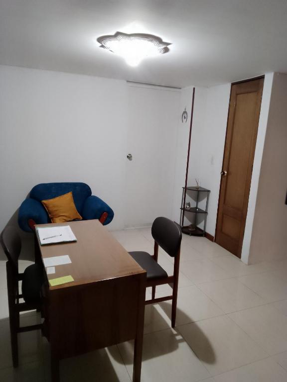 Posezení v ubytování Habitaciones C&S Bogotá