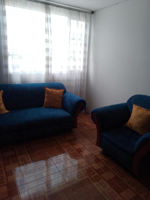 Posezení v ubytování Habitaciones C&S Bogotá