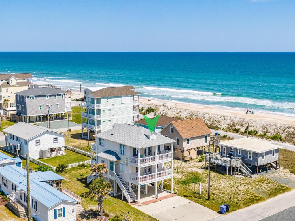 an aerial view of a beach with condos at Skippers Hideout in North Topsail Beach