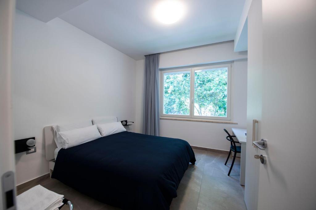Postel nebo postele na pokoji v ubytování Le Relais du Lierre