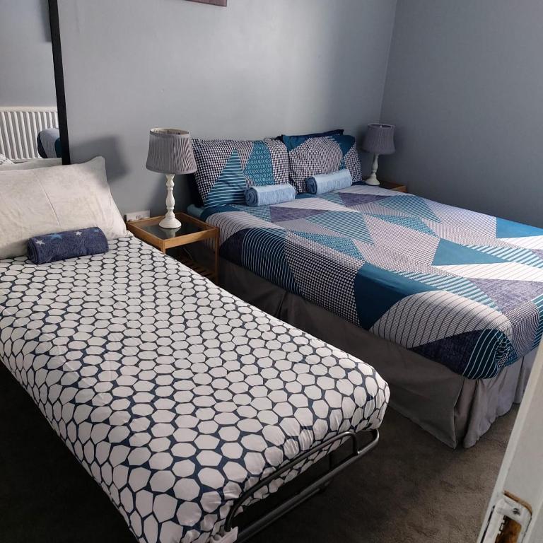 Postel nebo postele na pokoji v ubytování Pia House