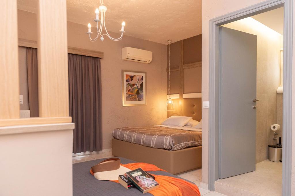 Postel nebo postele na pokoji v ubytování Lino Mare Boutique Hotel