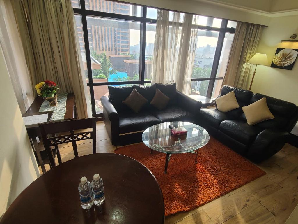 Posezení v ubytování KL Time Square Hotal Sarvice Suite