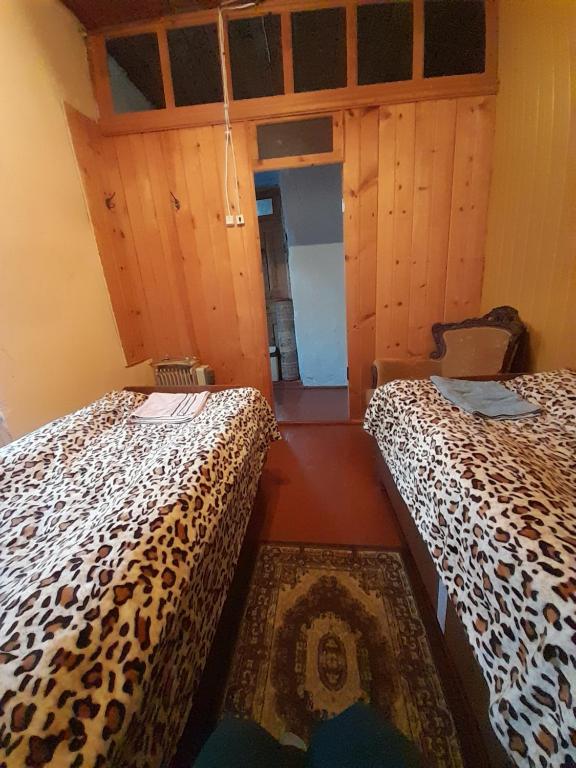 Postel nebo postele na pokoji v ubytování Guest House Zhora Kaldani