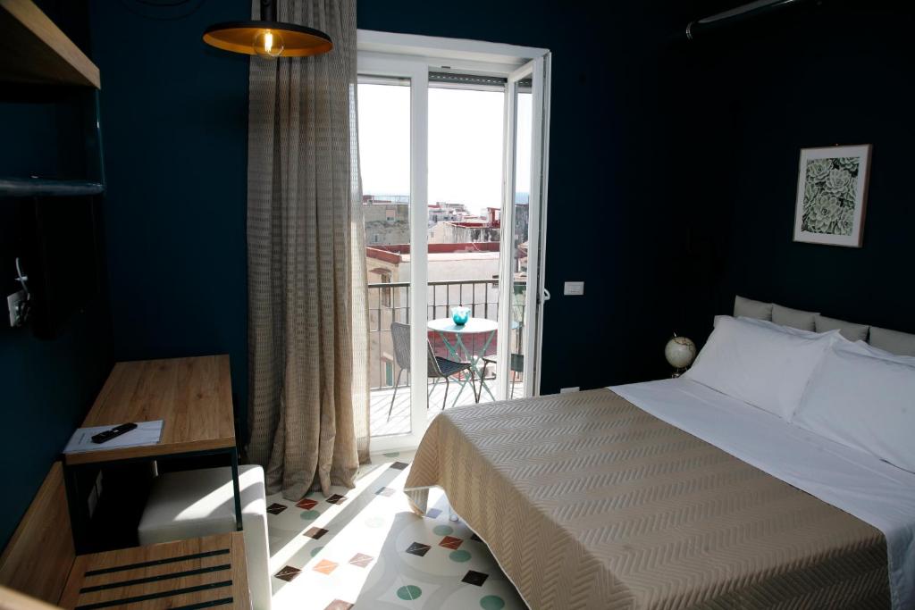 Postel nebo postele na pokoji v ubytování B & B Casa Portanova