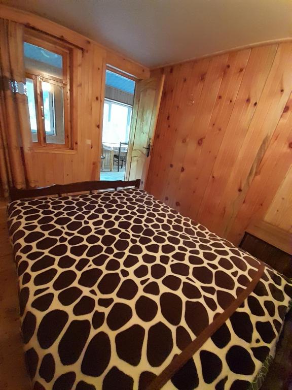 Postel nebo postele na pokoji v ubytování Guest House Zhora Kaldani