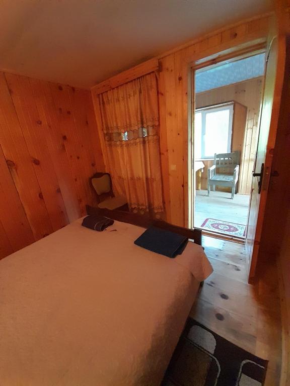 Postel nebo postele na pokoji v ubytování Guest House Zhora Kaldani