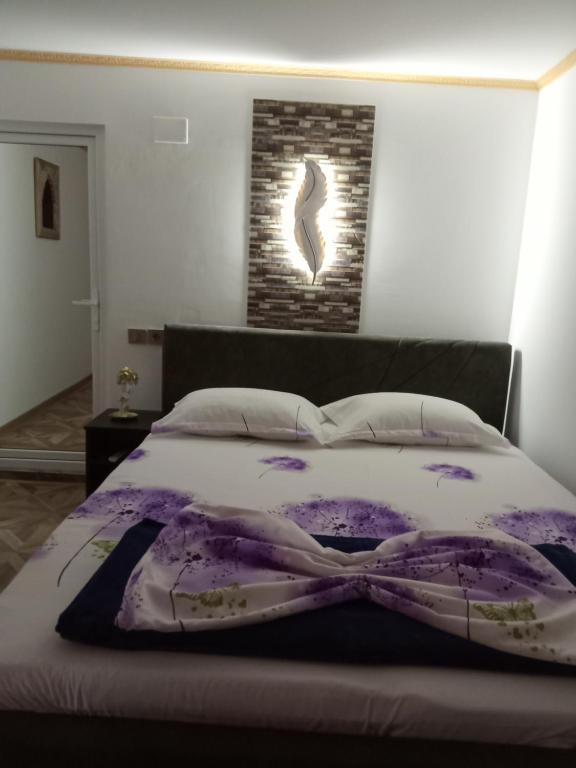 Postel nebo postele na pokoji v ubytování Kallithea