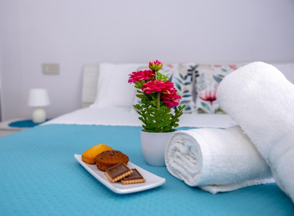 Postel nebo postele na pokoji v ubytování La Perla Luxury Rooms