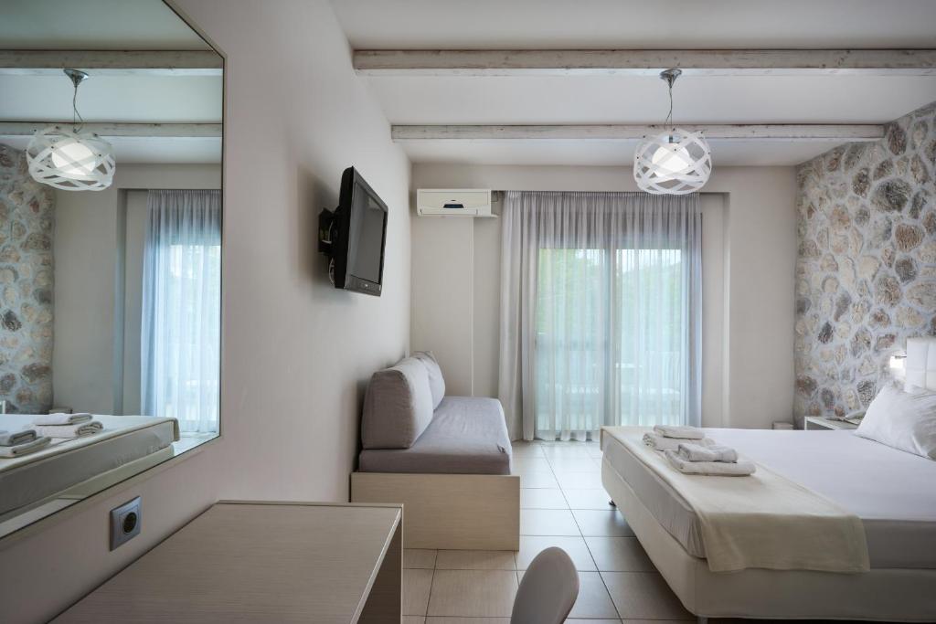 TV a/nebo společenská místnost v ubytování Altamar Hotel