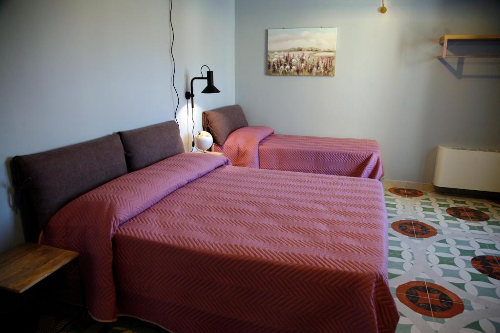 Postel nebo postele na pokoji v ubytování B & B Casa Portanova