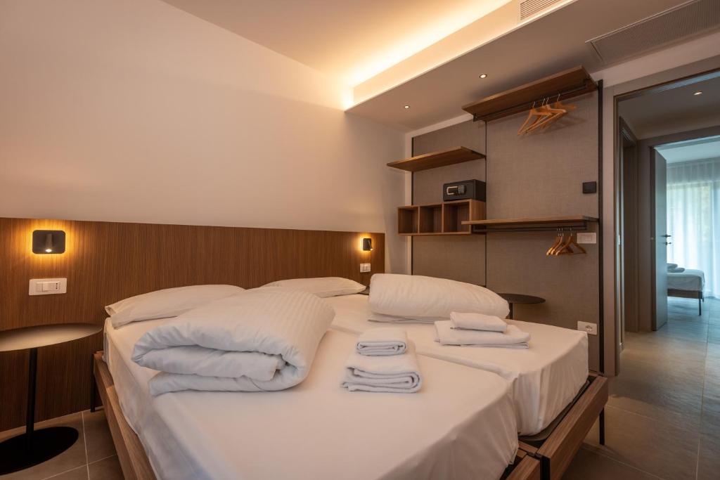 Postel nebo postele na pokoji v ubytování Residence Paradise