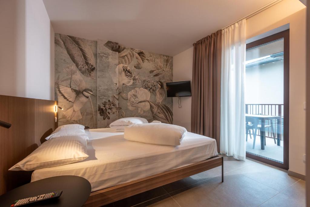 Postel nebo postele na pokoji v ubytování Residence Paradise
