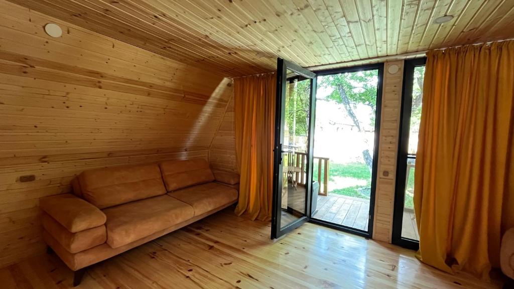 Posezení v ubytování Garden House Mestia