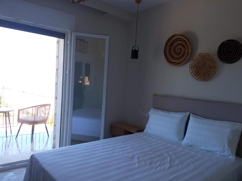 Posteľ alebo postele v izbe v ubytovaní Zephyros Villas - Agios Nikitas