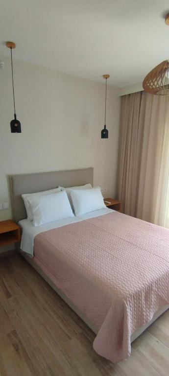Posteľ alebo postele v izbe v ubytovaní Zephyros Villas - Agios Nikitas