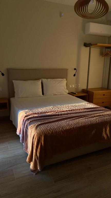 Posteľ alebo postele v izbe v ubytovaní Zephyros Villas - Agios Nikitas