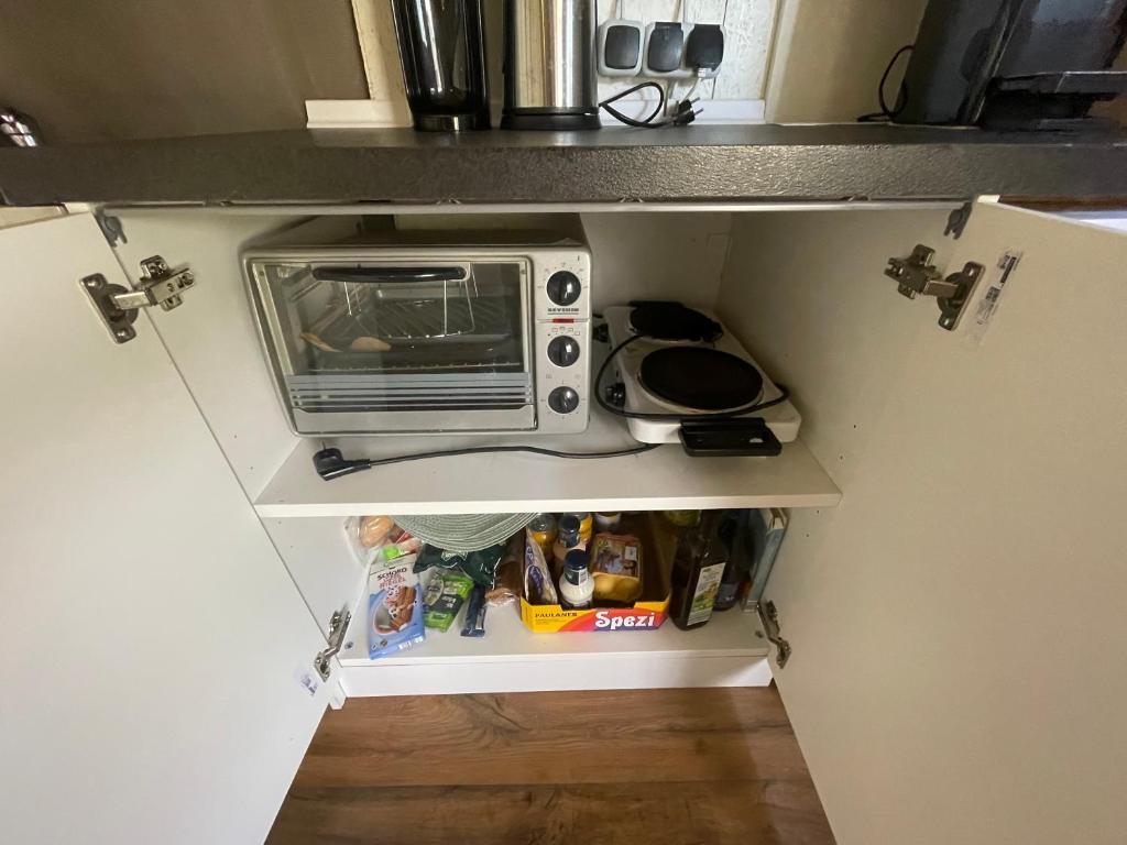 Kuchyň nebo kuchyňský kout v ubytování Campingwohnung am Silbersee in Freiburg