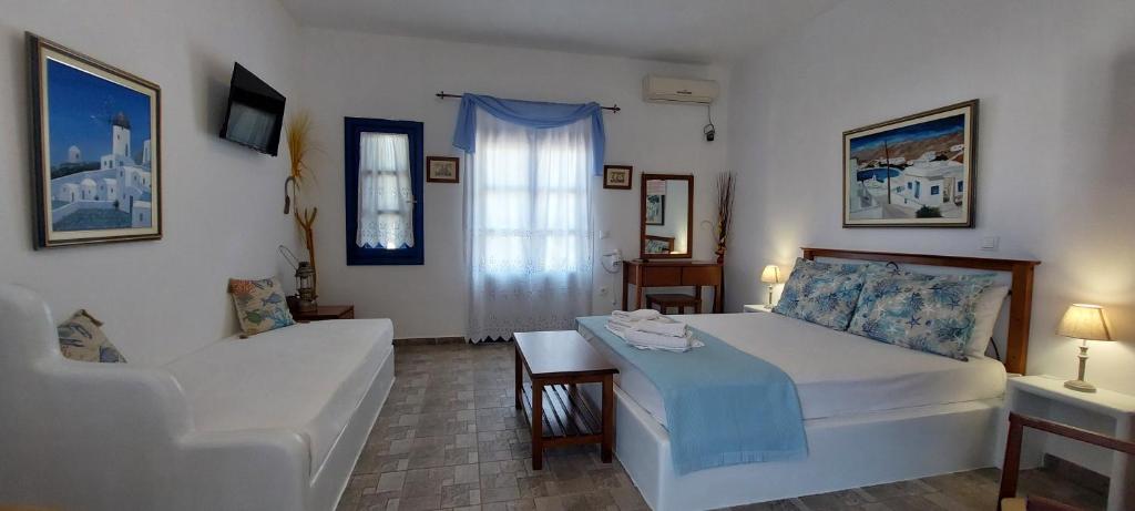 Postel nebo postele na pokoji v ubytování Aegean Star Hotel