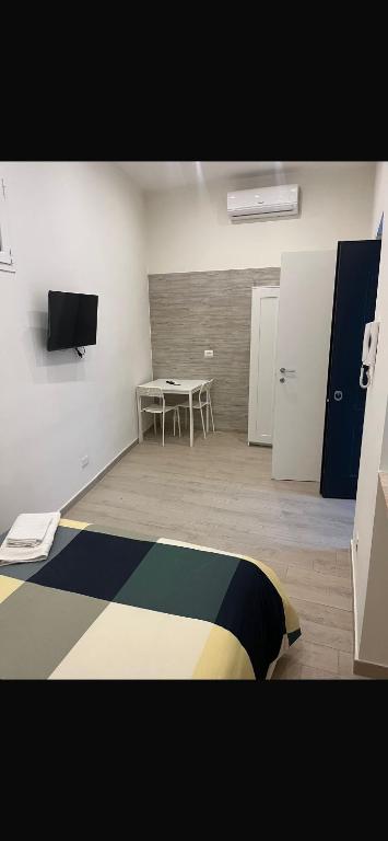 TV a/nebo společenská místnost v ubytování La Dimora Di Angelo 2