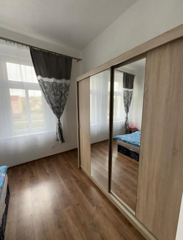 Postel nebo postele na pokoji v ubytování Penzion Sokolov 6