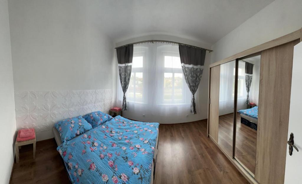 Postel nebo postele na pokoji v ubytování Penzion Sokolov 6