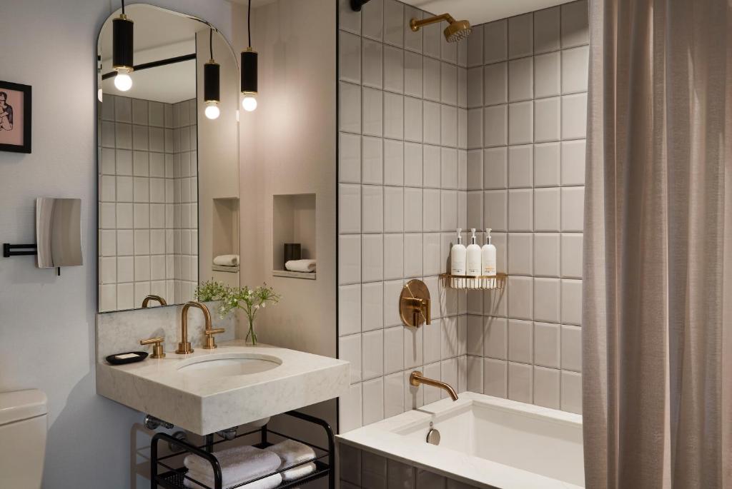 
Essential Queen Room with Two Queen Beds and Walk-In Shower
