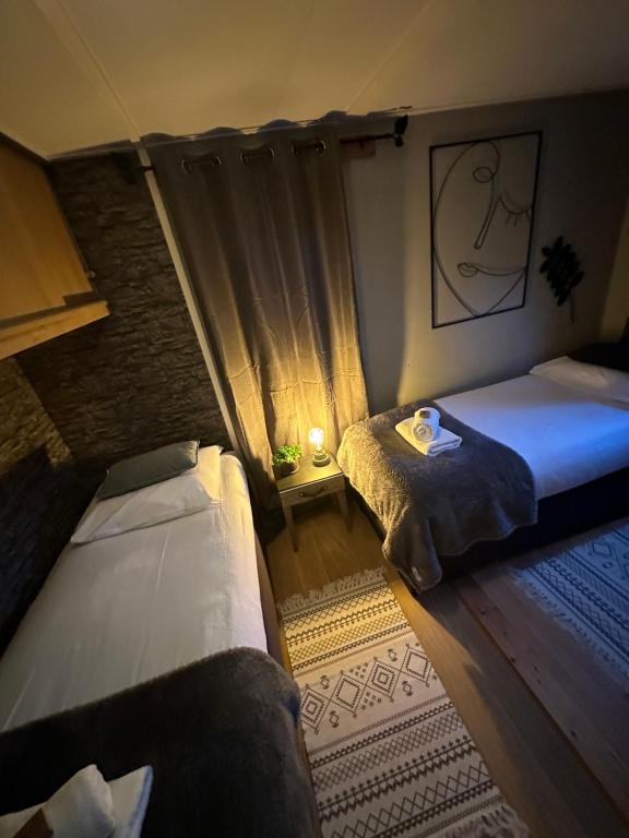 Postel nebo postele na pokoji v ubytování Chalet Harmony Lux Privé Wellness