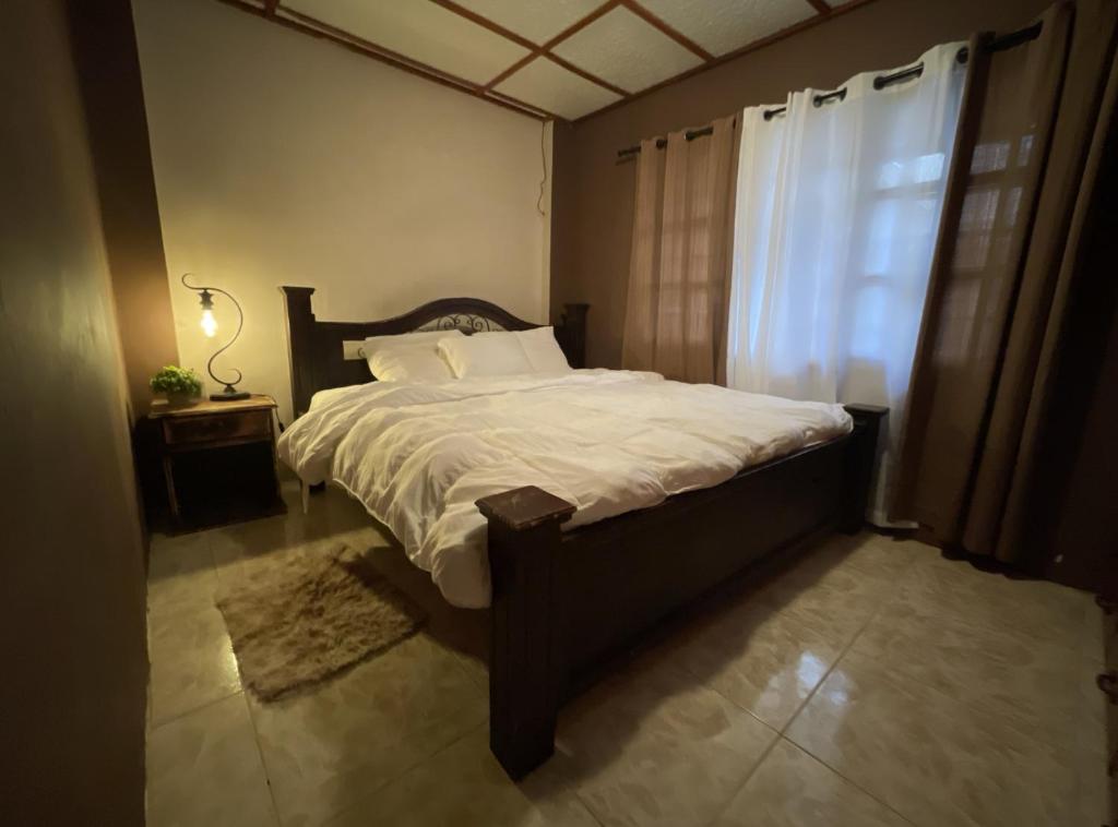 Letto o letti in una camera di Casa Mia Volcan