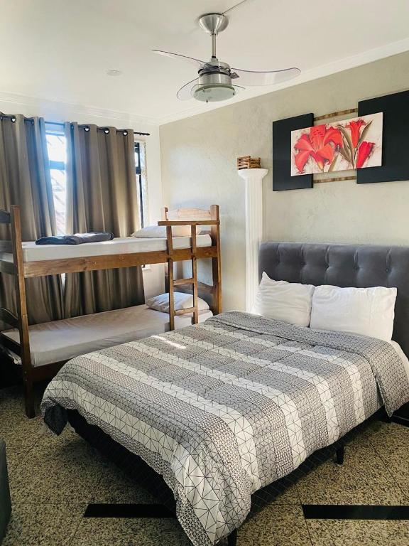 Postel nebo postele na pokoji v ubytování Hostel Anprado 1