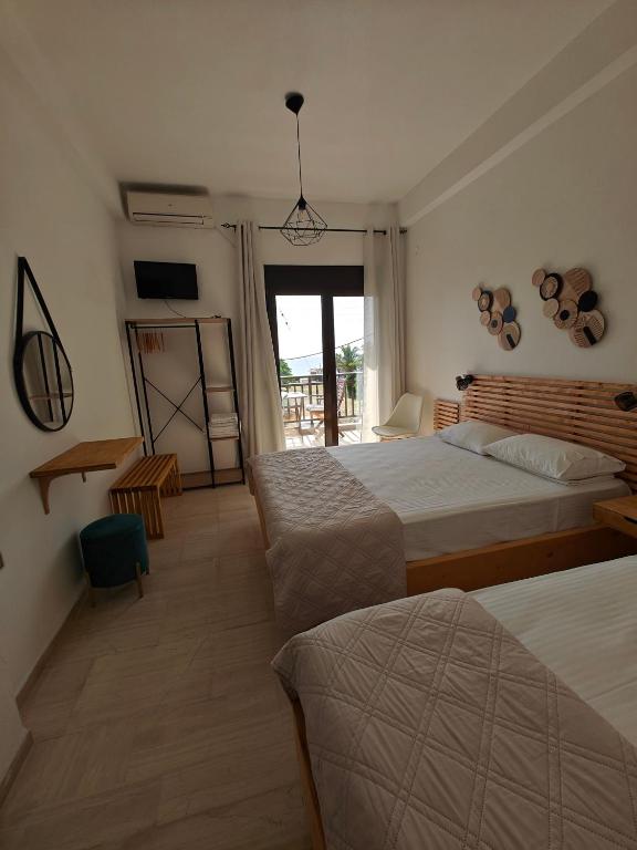 Postel nebo postele na pokoji v ubytování Anthoula House Sarti