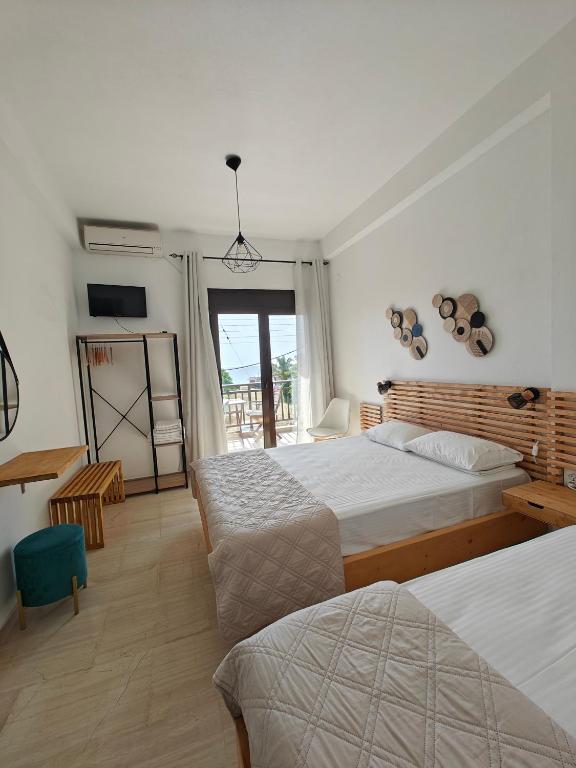 Postel nebo postele na pokoji v ubytování Anthoula House Sarti